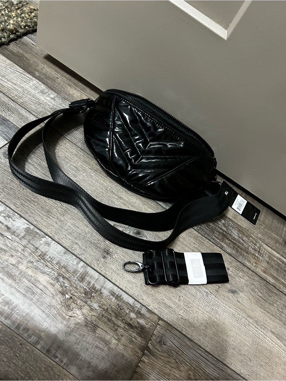 black glossy Think Royln Little Runaway Belt Bag crossbody patent black